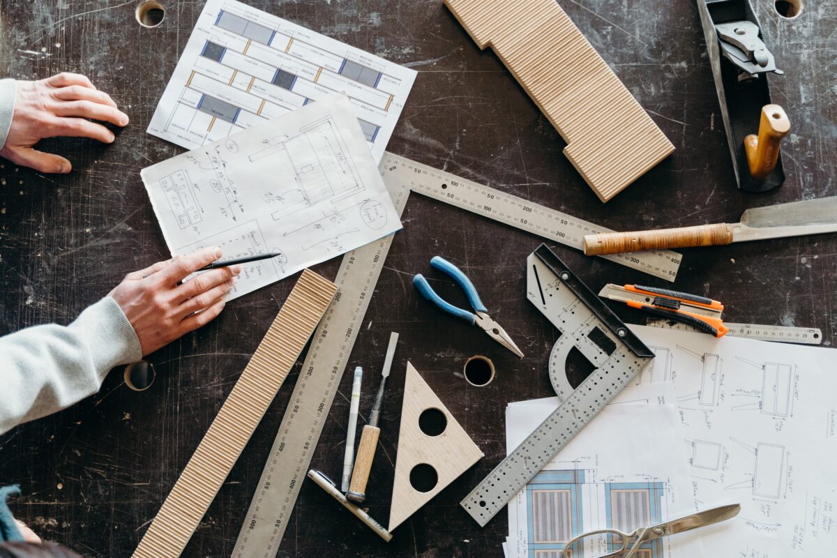 carpentry desk with tools laid out